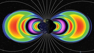 An illustration of the Earth on a space background with two lobes of colors extending on either side of the globe.
